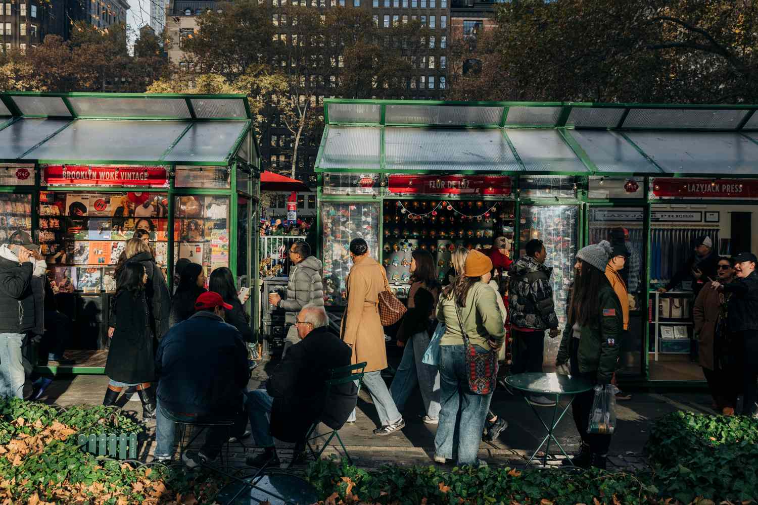 People attend a holiday market in Bryant Park in New York City.